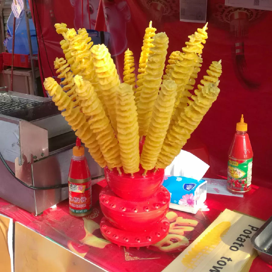 迎春花市今开福中福买盆鲜花过大年